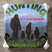 Bigfoot family against Mount St. Helens, Washington landscape.