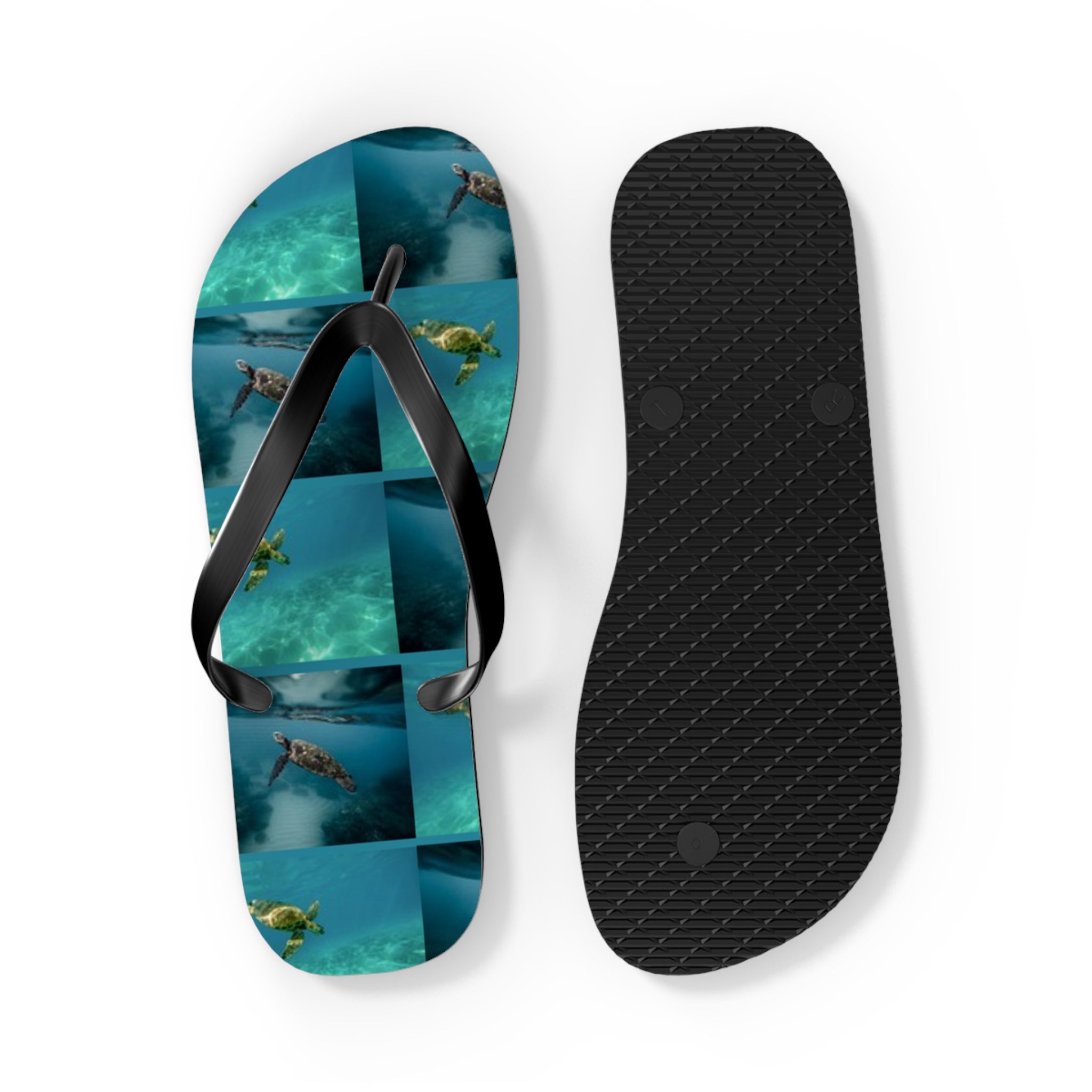 Flip-flops featuring sea turtles swimming in turquoise water.