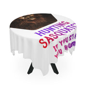 Round tablecloth with "Hunting Sasquatch" text and Bigfoot's face.