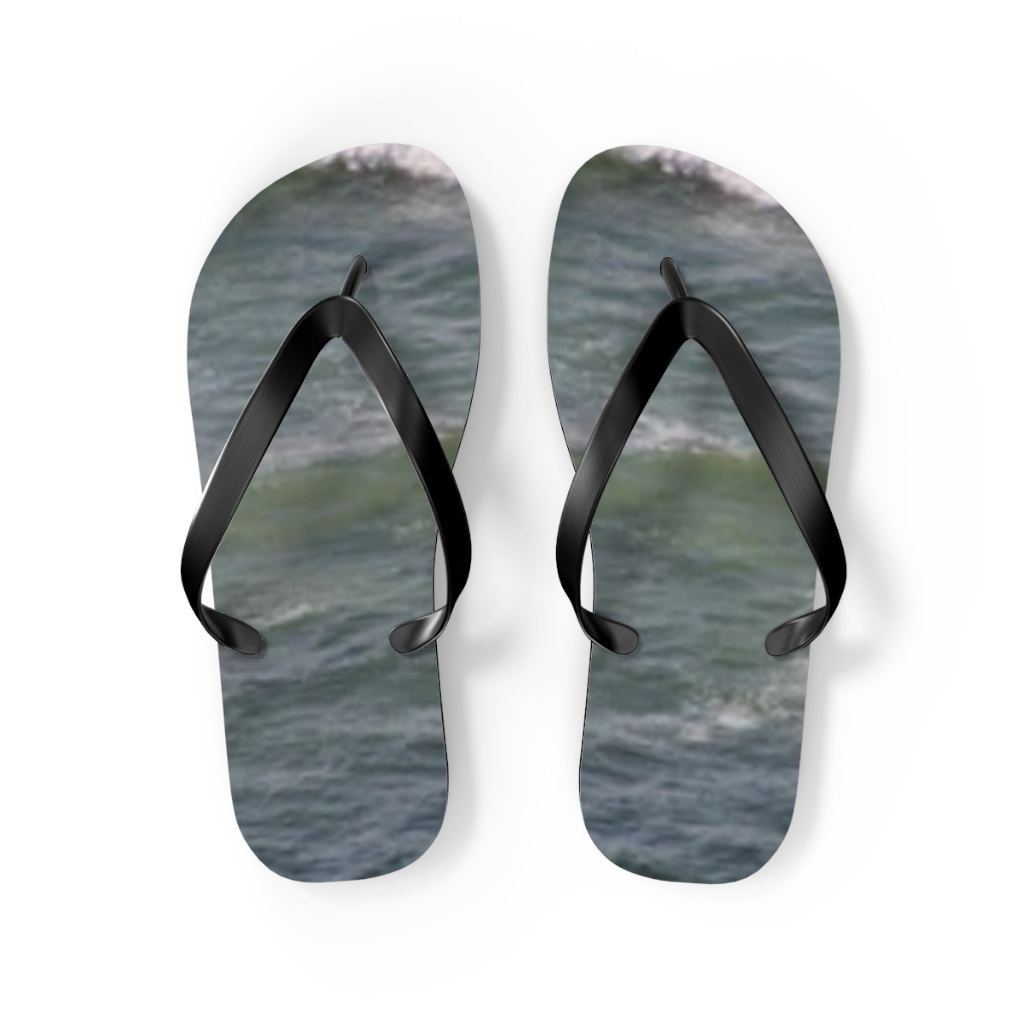 Flip-flops with a blue wave pattern on white background.
