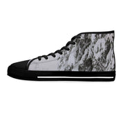 High-top sneakers with a black sole and laces, featuring a snow-covered mountain landscape print.