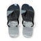 Pair of flip-flops with a scenic mountain and water landscape print.