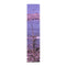 Narrow banner showing a small evergreen tree in foreground and purple ocean.