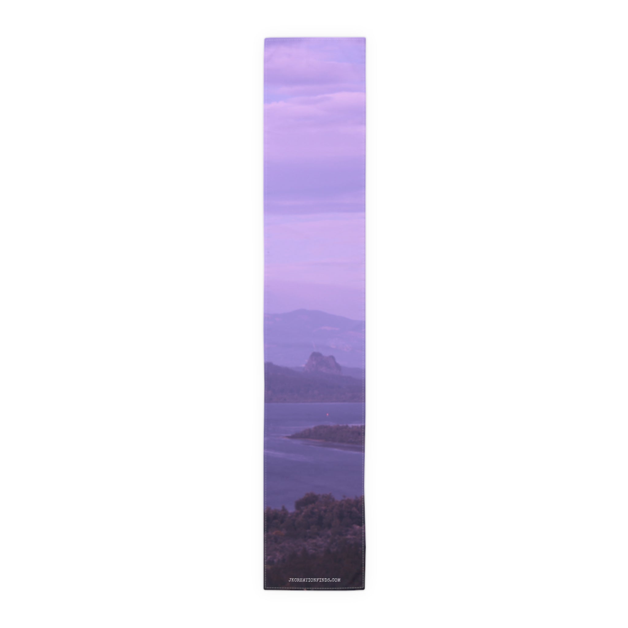 Purple landscape panorama on a long, narrow fabric banner.