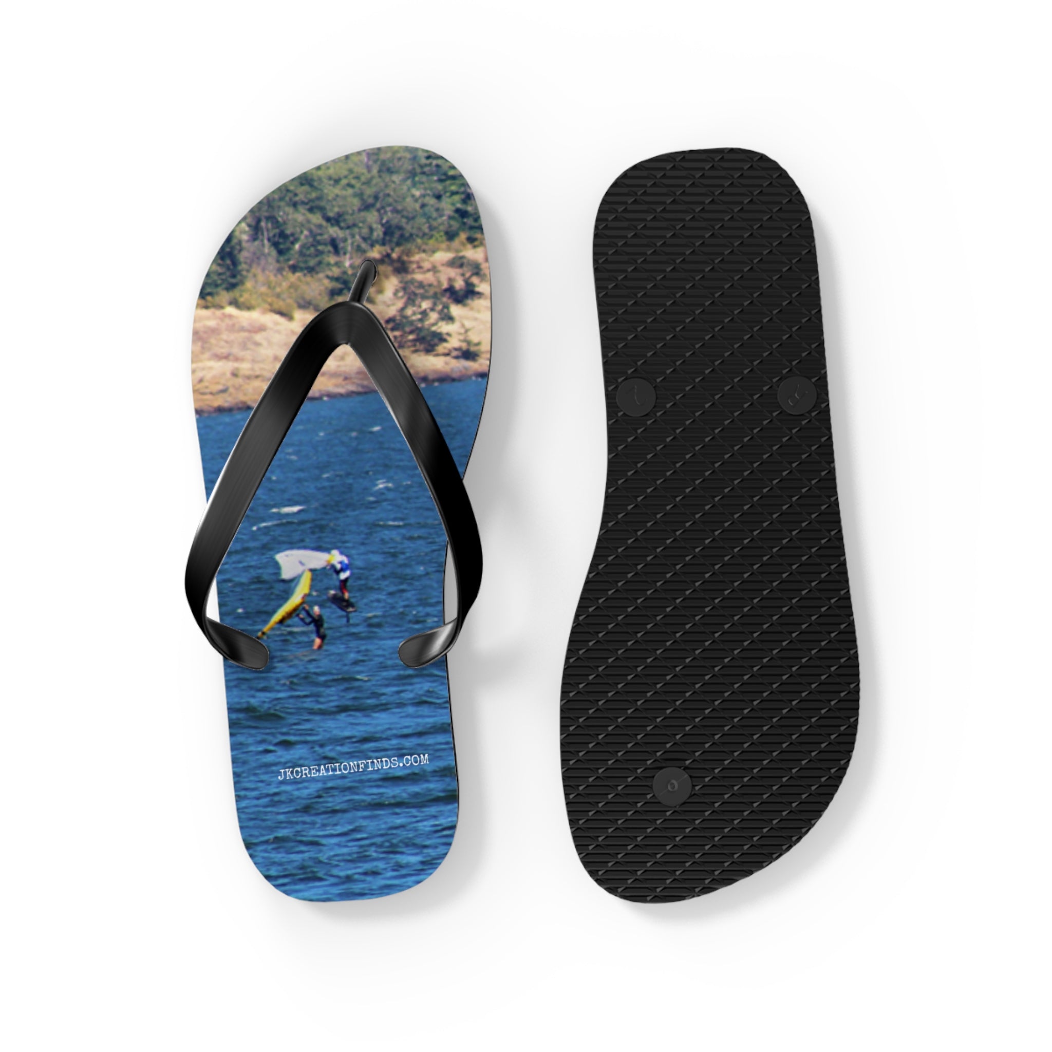 Flip-flops with a water skier on a blue lake.