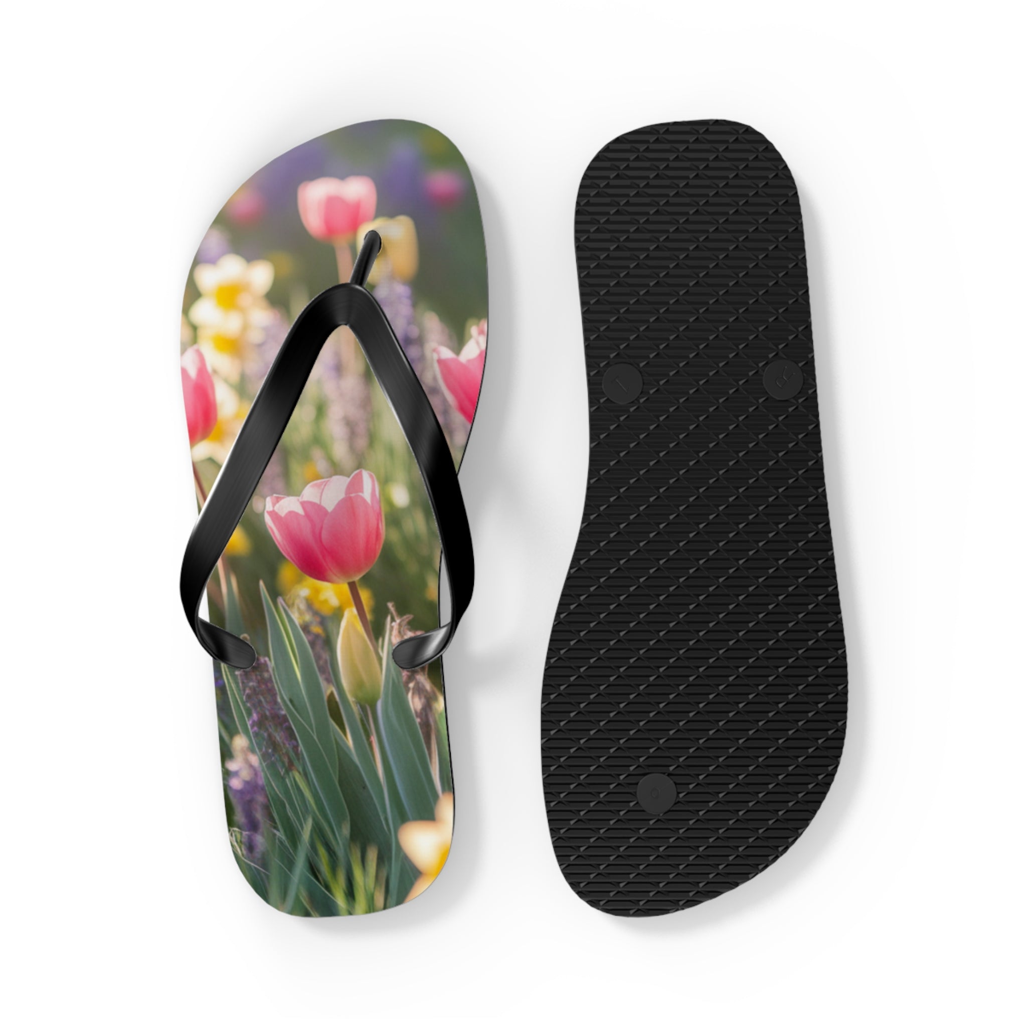 Flip-flops with a close-up view of pink tulips and daffodils.