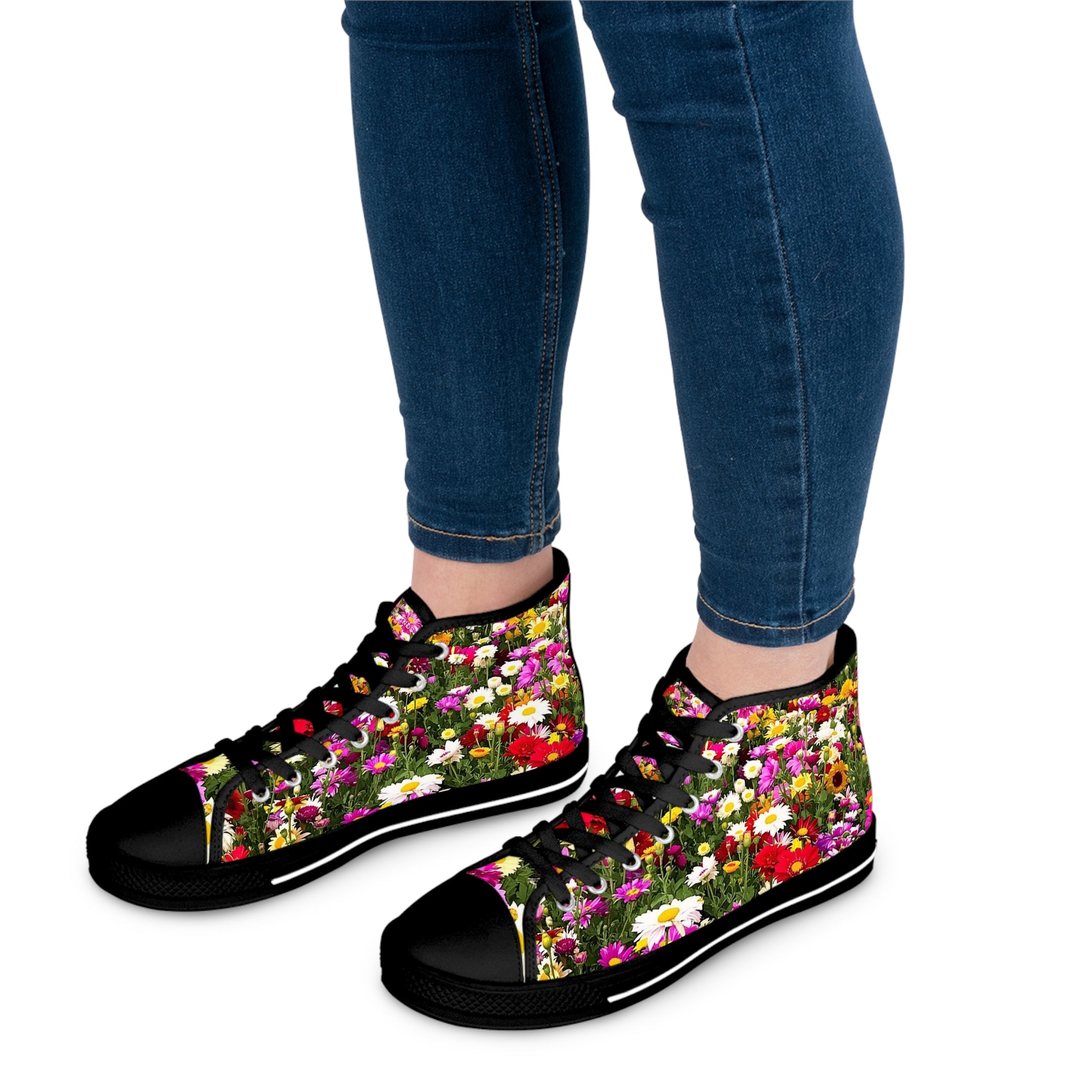 High-top sneakers with a vibrant floral print and dark laces.