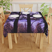 Tablecloth with purple forest and trees pattern.