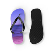 Flip-flops with a sunset beach scene on the soles.