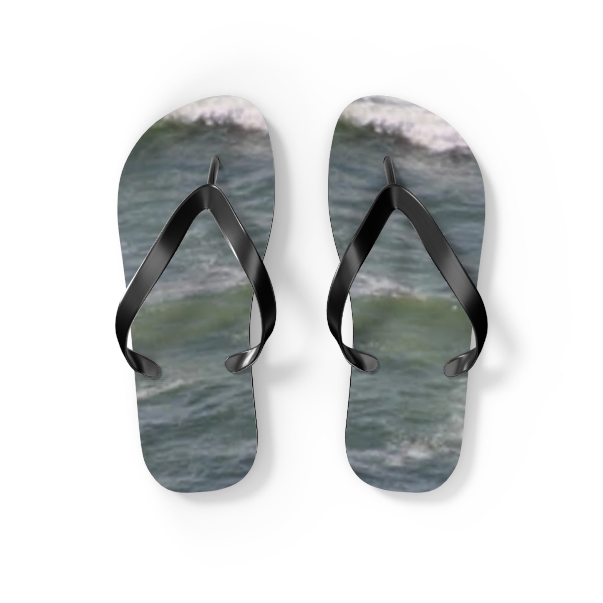 Flip-flops with a turquoise ocean wave design.