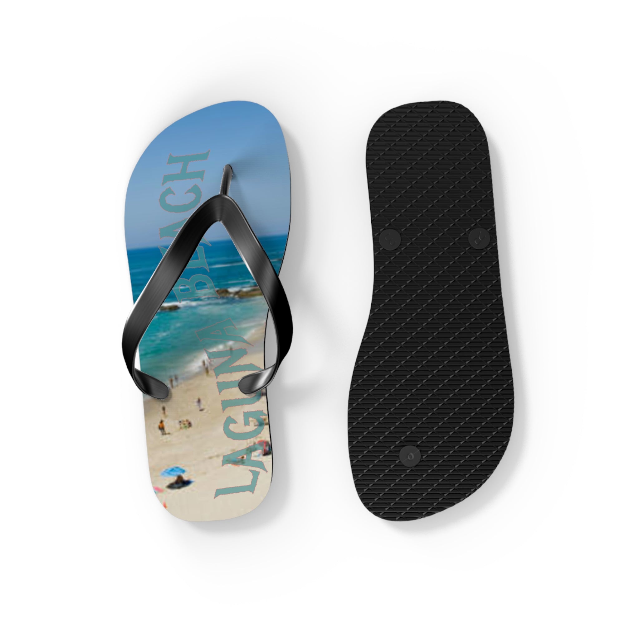Flip flops with "Laguna Beach" text and beach scene on one, black sole on other.
