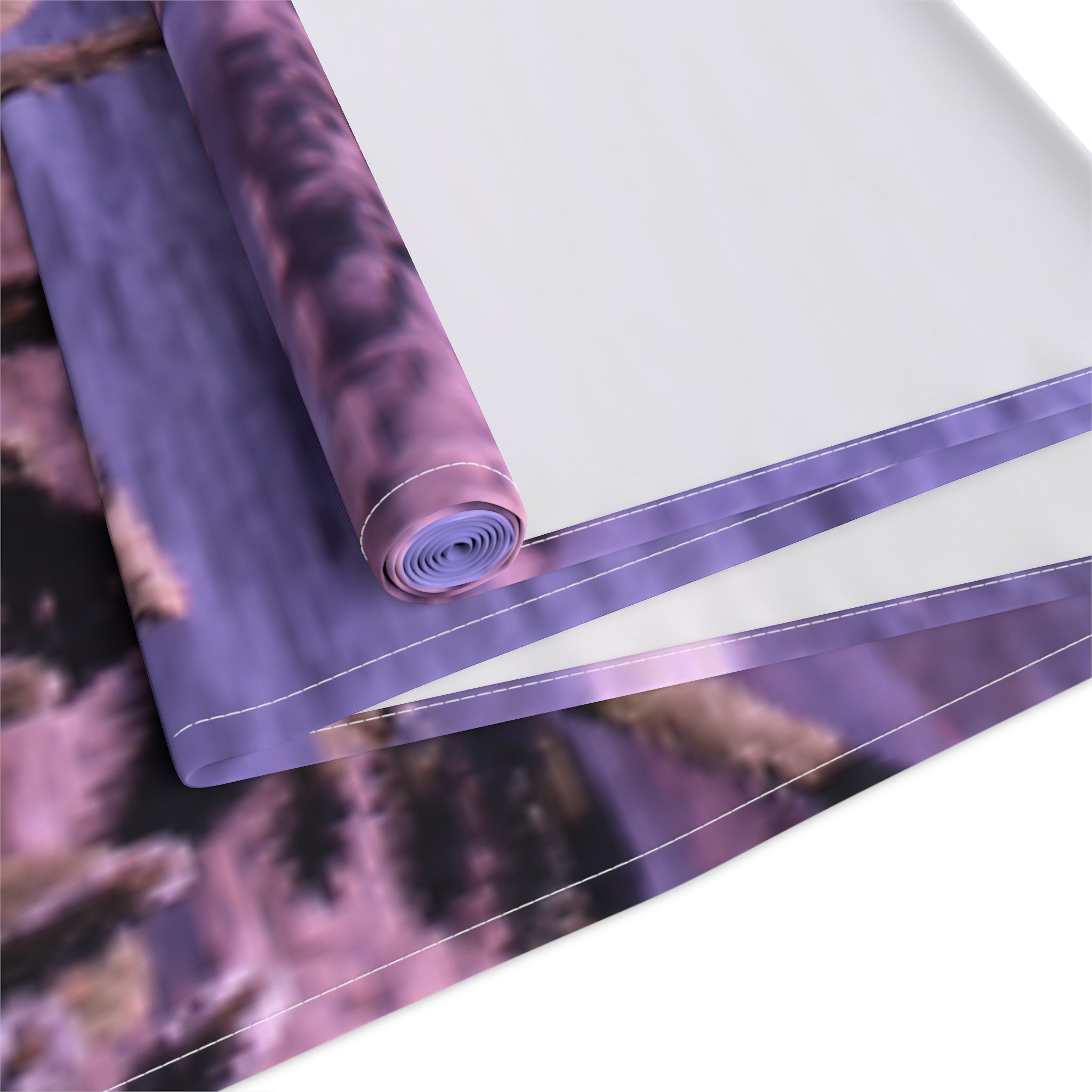 Rolled fabric runner with a blurred purple and brown abstract pattern.