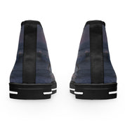 Back view of two high-top sneakers with a dark, scenic landscape print.