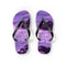 Purple flip-flops with a rocky beach and water pattern.