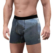 Men's boxer briefs with a forest and mountain landscape print.