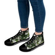 High-top sneakers with a white floral print and green leaves.