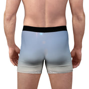 Men's boxer briefs with a light blue sky and lens flare pattern.