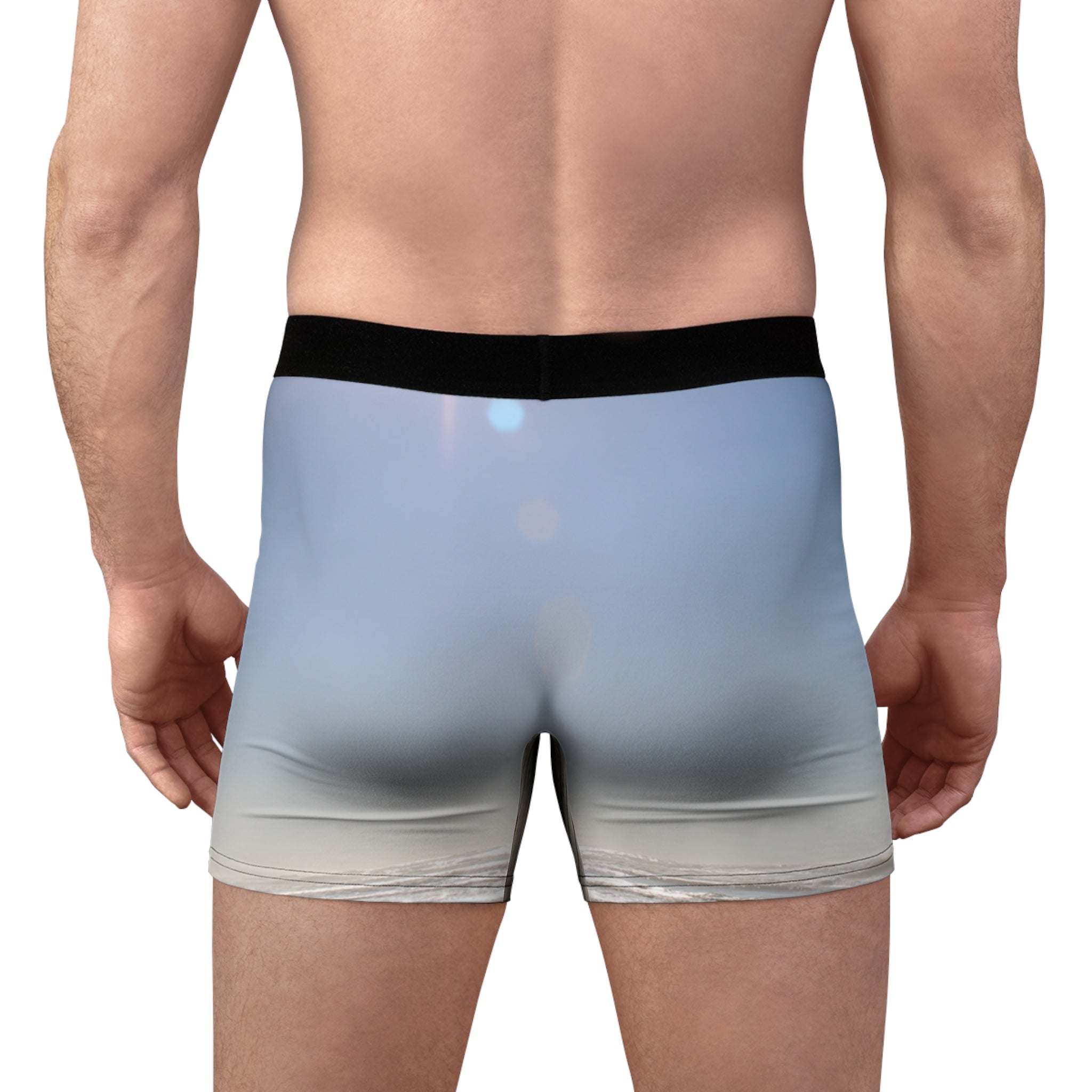 Men's boxer briefs with a light blue sky and lens flare pattern.