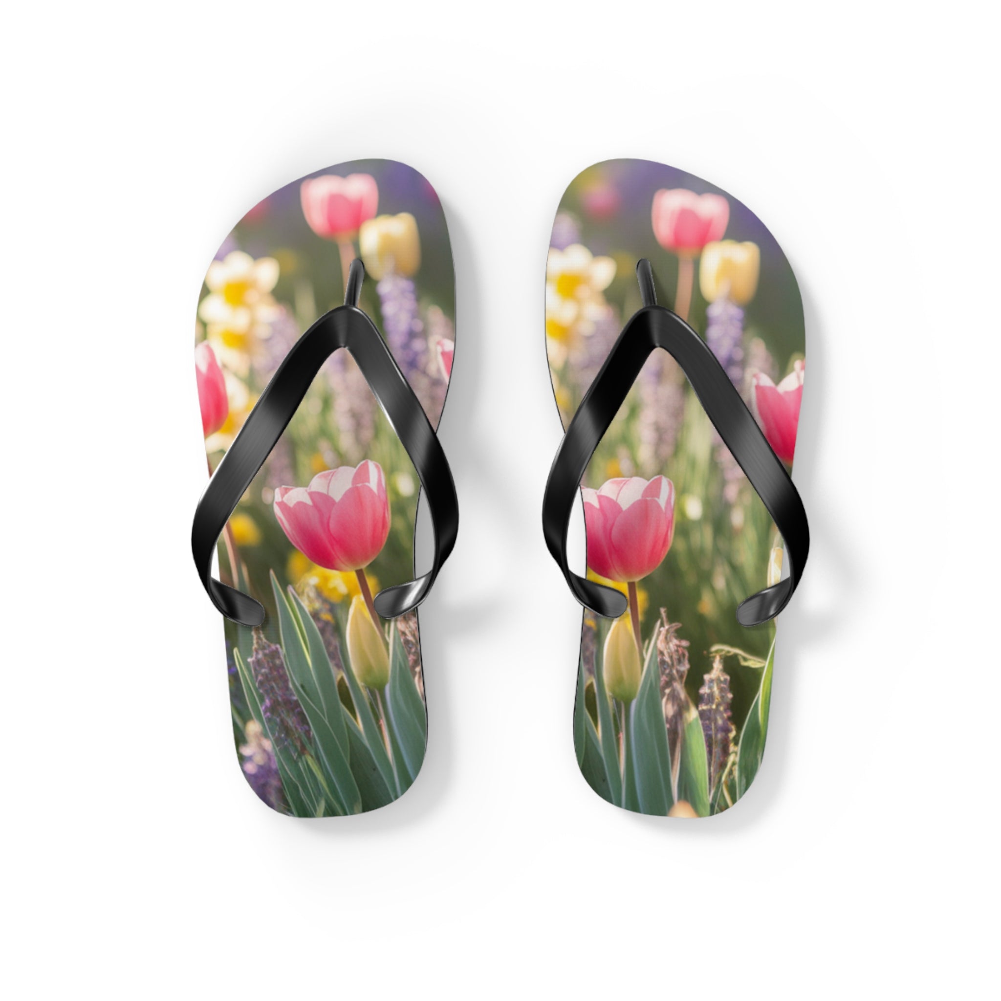 Flip-flops with pink tulips and purple flowers on the soles.