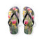 Flip-flops with pink tulips and purple flowers on the soles.