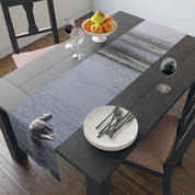 Table runner with a serene beach scene, featuring a lone bird near calm waves.