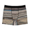 Men's boxer briefs with a landscape print of dry, cracked earth and a blue body of water.
