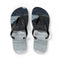 Flip-flops with a black strap and a scenic landscape design.