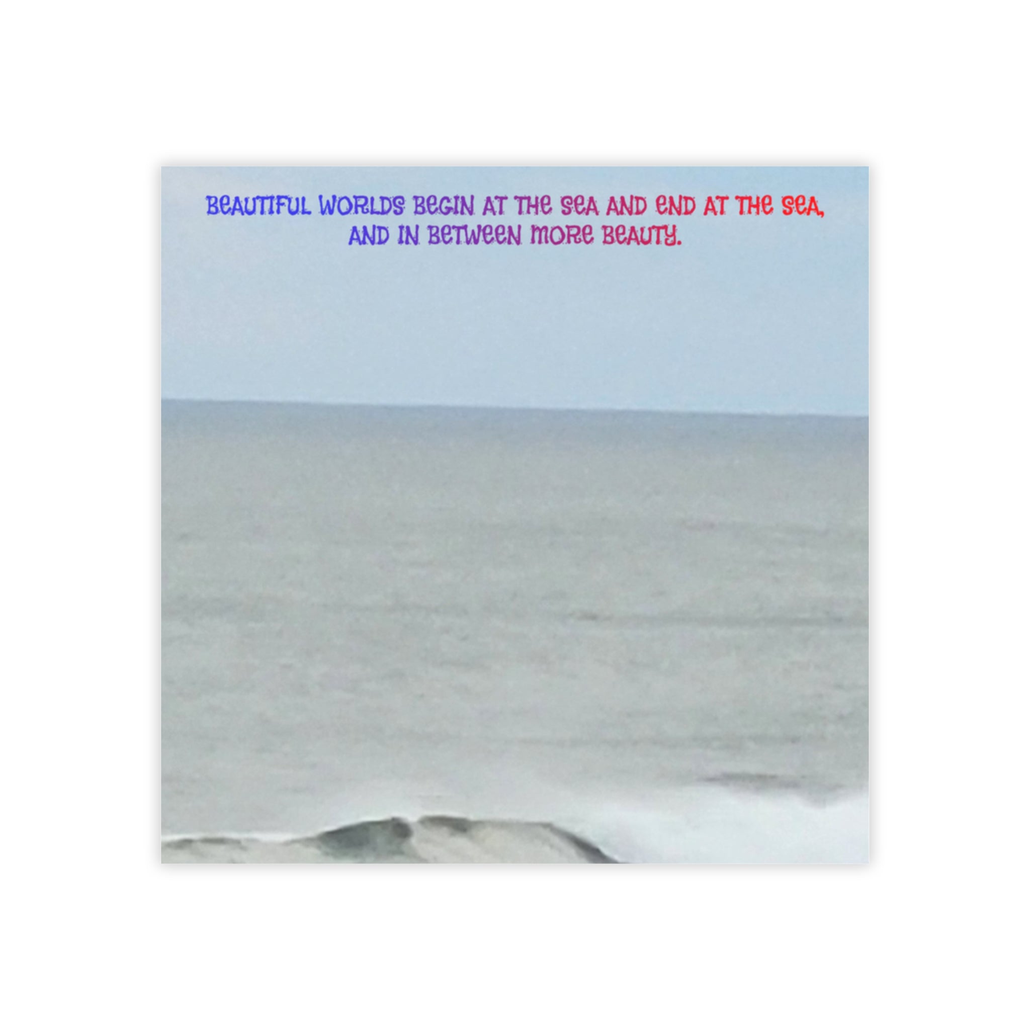 Quote about the sea and beauty over a calm ocean landscape.