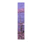 Tall, thin pine sapling in front of a rocky, purple ocean.