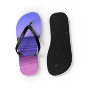 Two flip-flops, one with a beach sunset graphic, isolated on white.