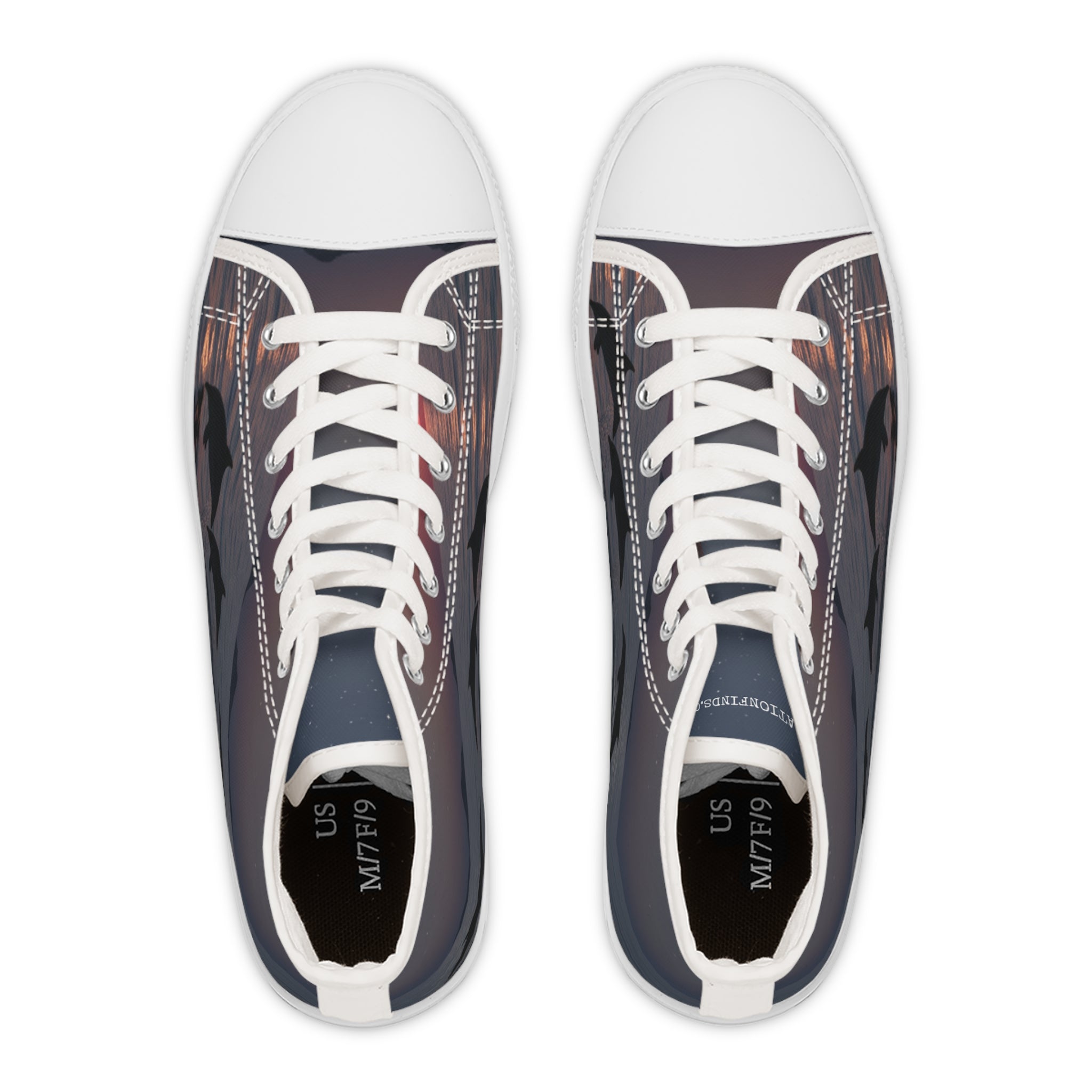 High-top sneakers with a sunset over water landscape printed on them.