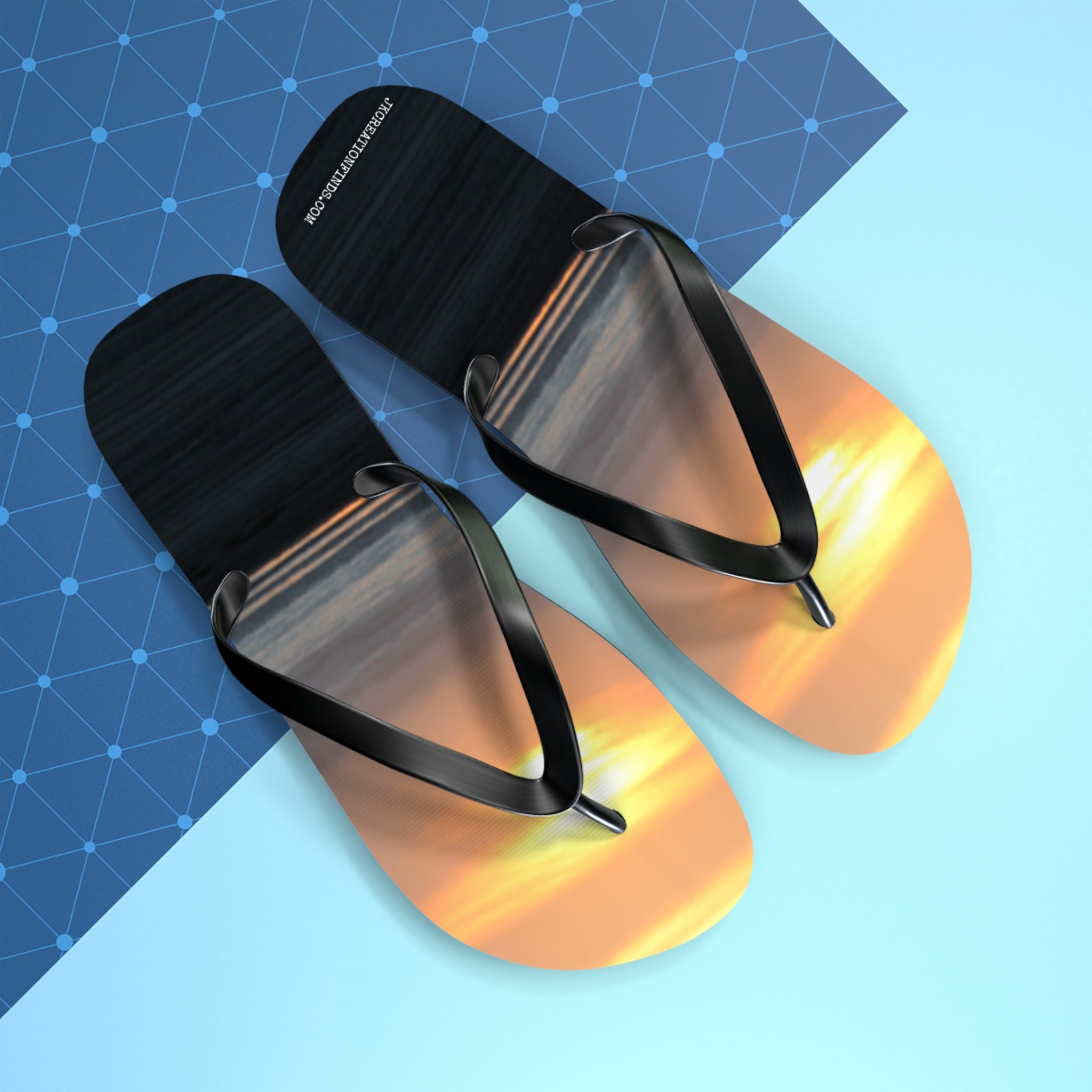 Flip flops with a sunset design on a blue and white background.