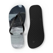 Flip-flops with a scenic landscape design and textured sole.
