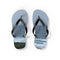 Light blue flip-flops with a tropical ocean and green cliffs scene.