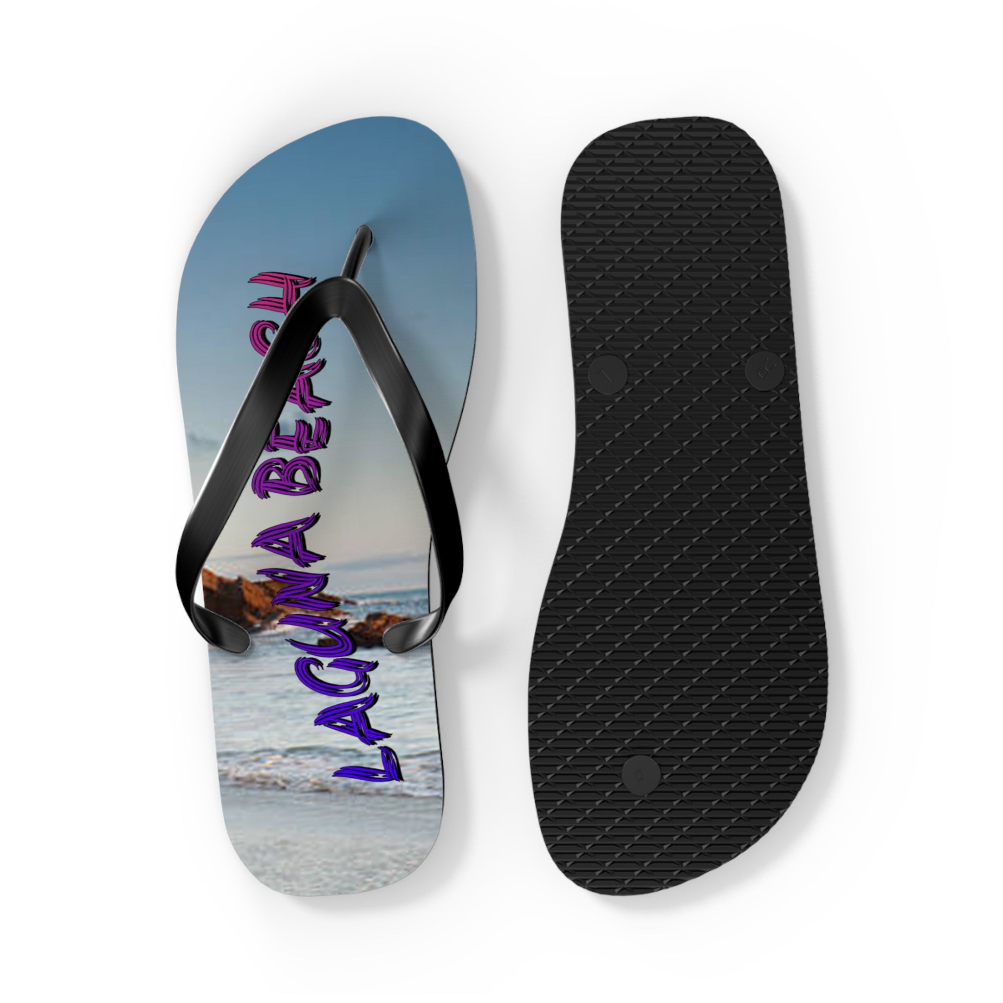 Laguna Beach flip-flops with a beach scene on the left flip-flop.