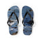 Flip-flops with ocean waves and rocks pattern.