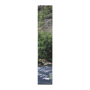 River scene with trees and rocks.