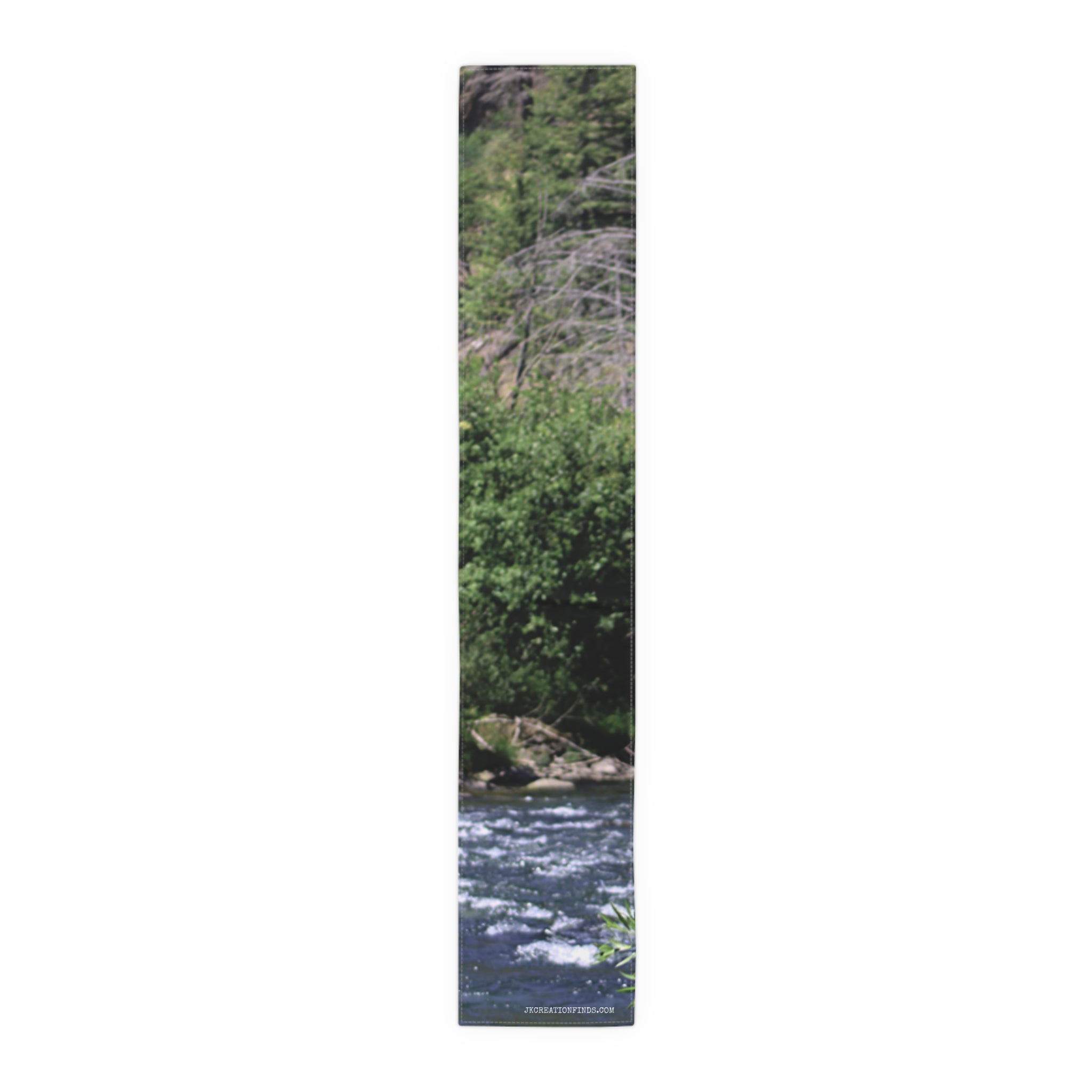 River scene with trees and rocks.