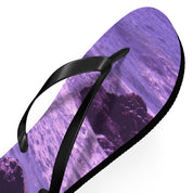 Flip-flops with a purple ocean wave design.