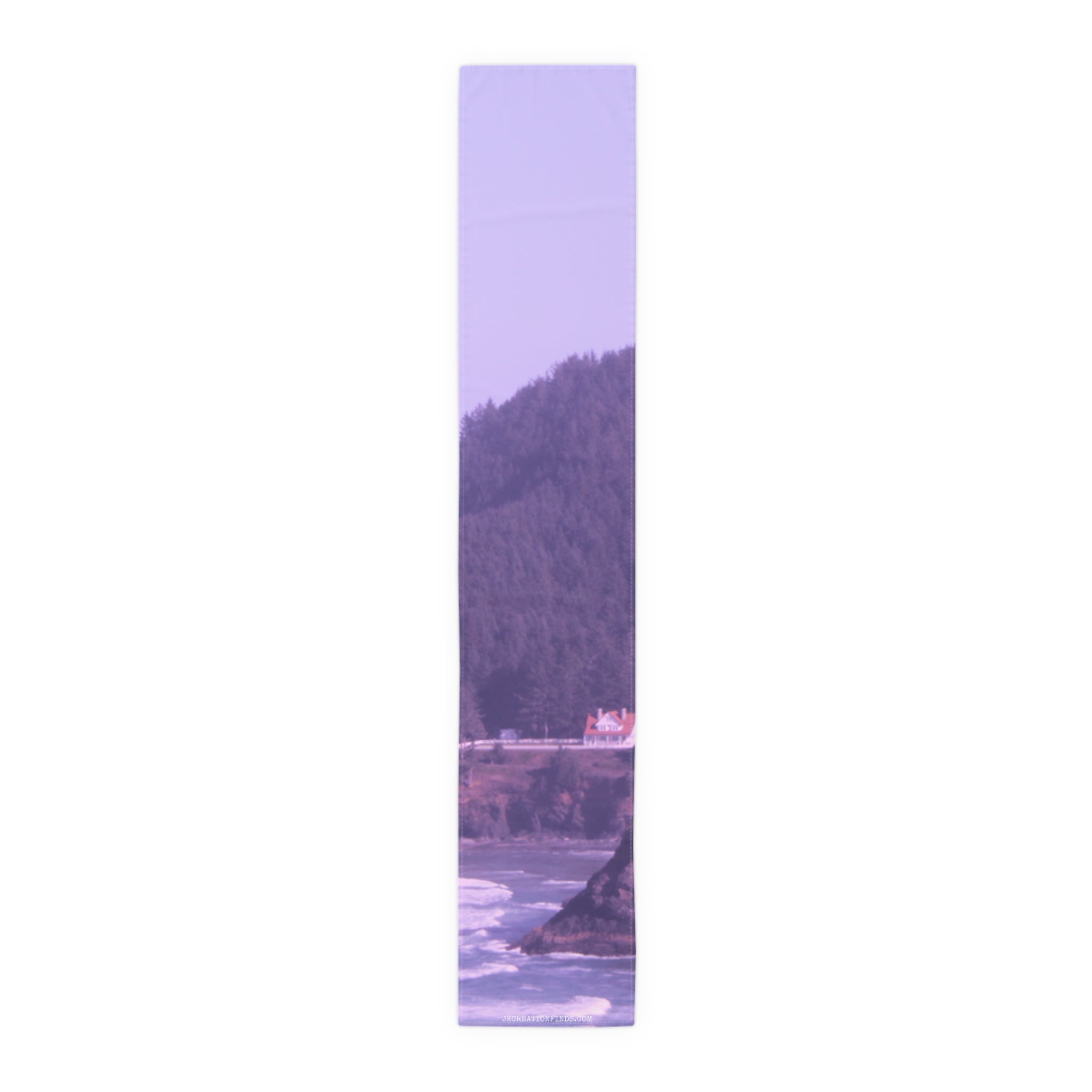Scarf with a scenic coastal landscape and a white house.