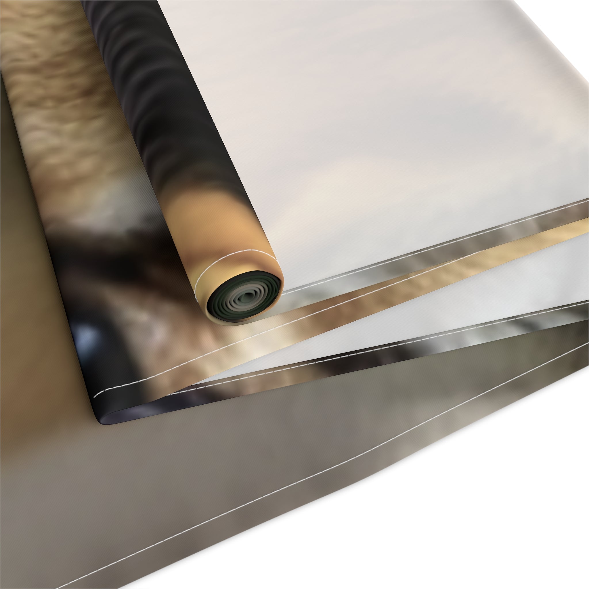 Rolled fabric with close-up of animal fur and blurred background.