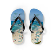 Laguna Beach flip-flops with people on a sandy beach and ocean.