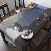 Table runner with a blue gradient and mountain landscape design.