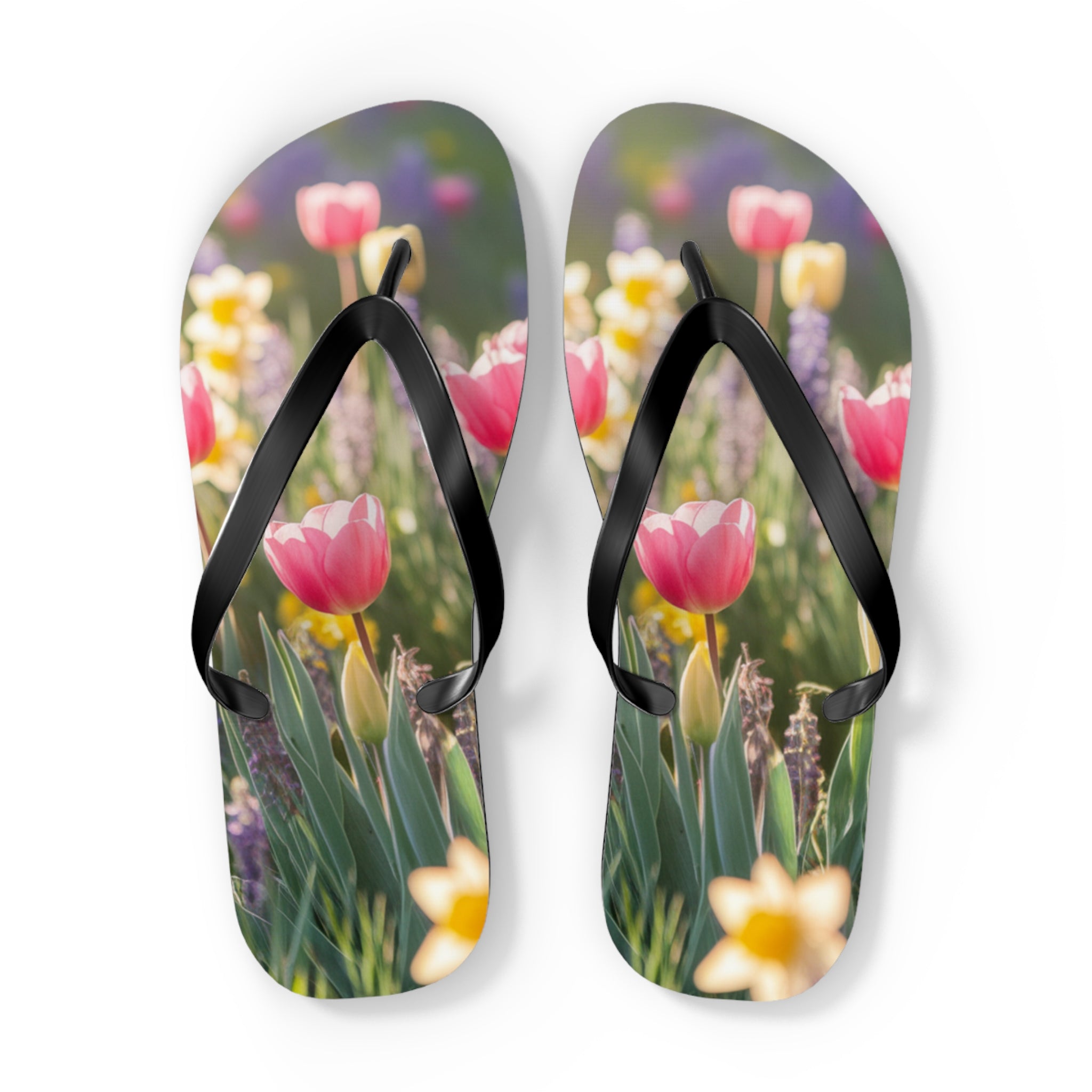 Flip-flops with a floral pattern featuring pink tulips and daffodils.