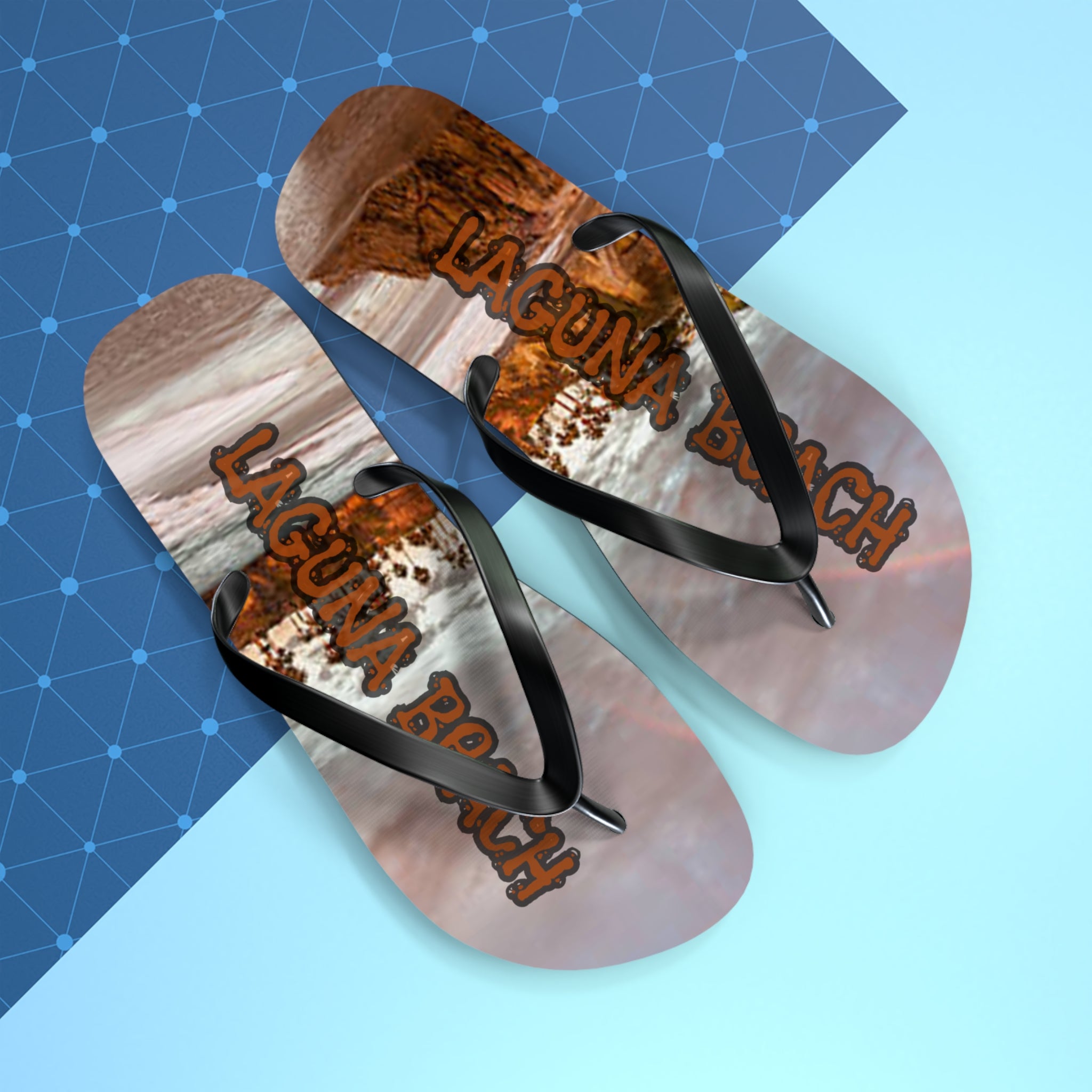 Flip-flops with "Laguna Beach" text and a natural landscape design.