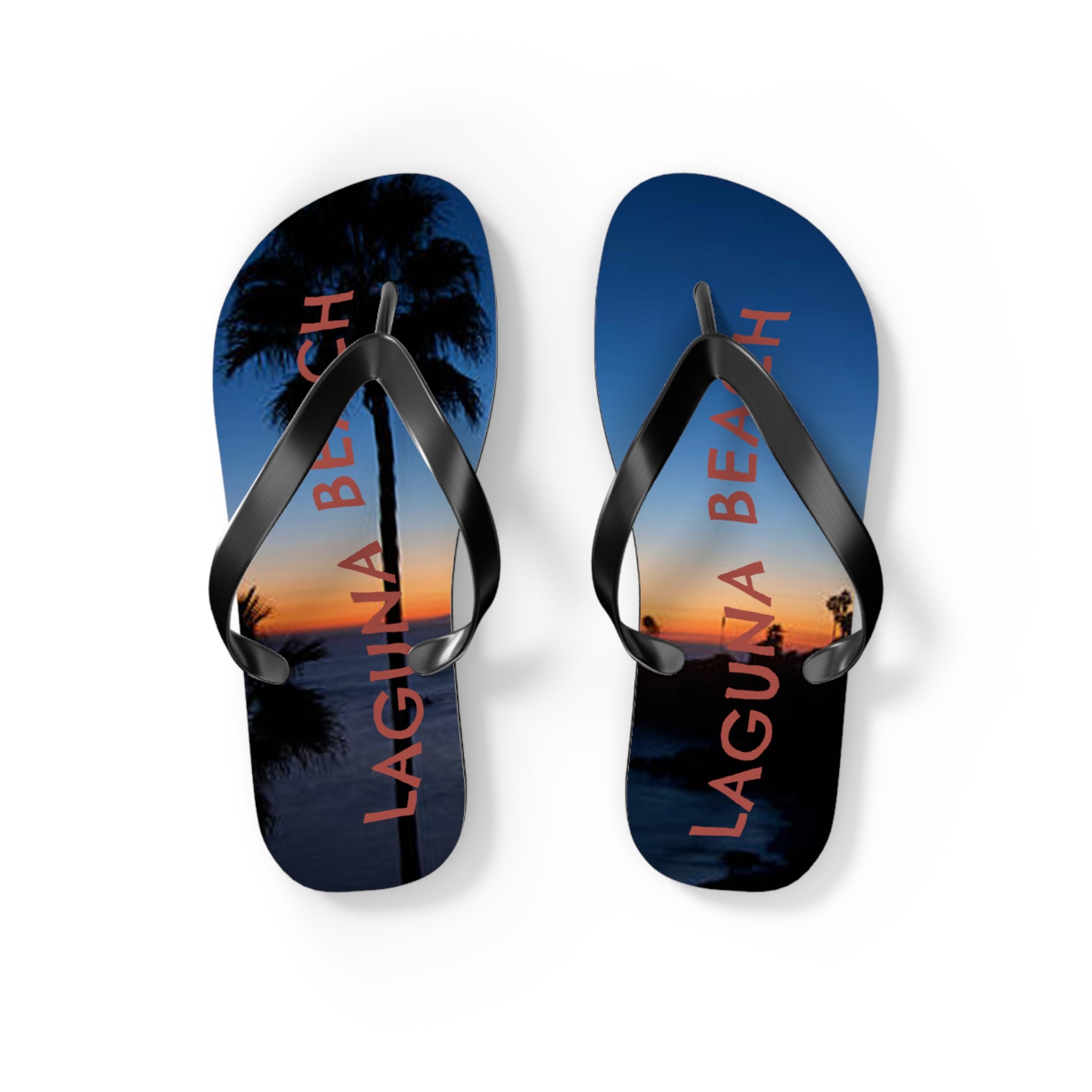Flip-flops with a sunset and palm tree scene featuring "LAGUNA BEACH" text.