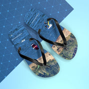 Flip-flops with images of kite surfers near a cliffside.