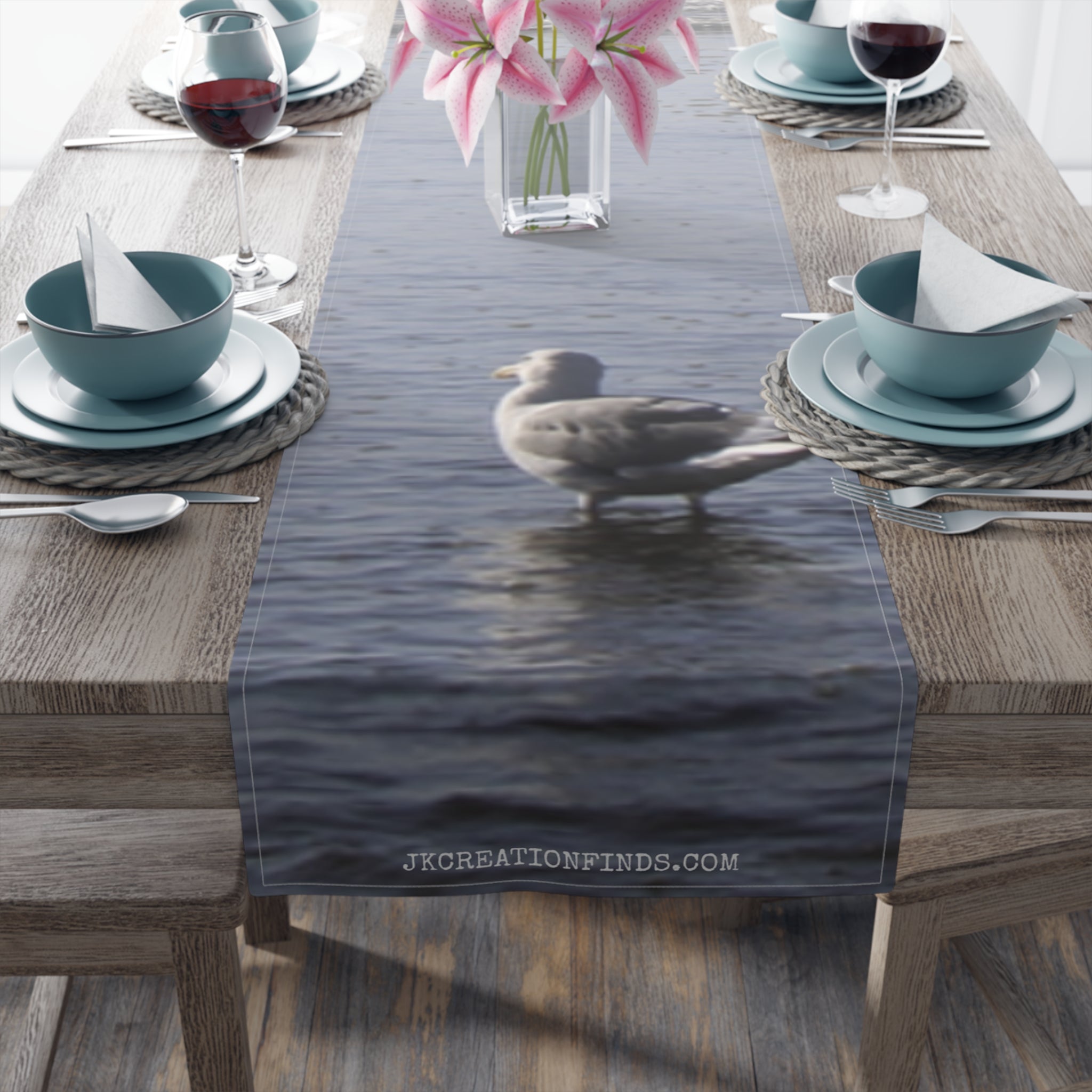 Seagull on water with "JKCREATIONFINDS.COM" text.