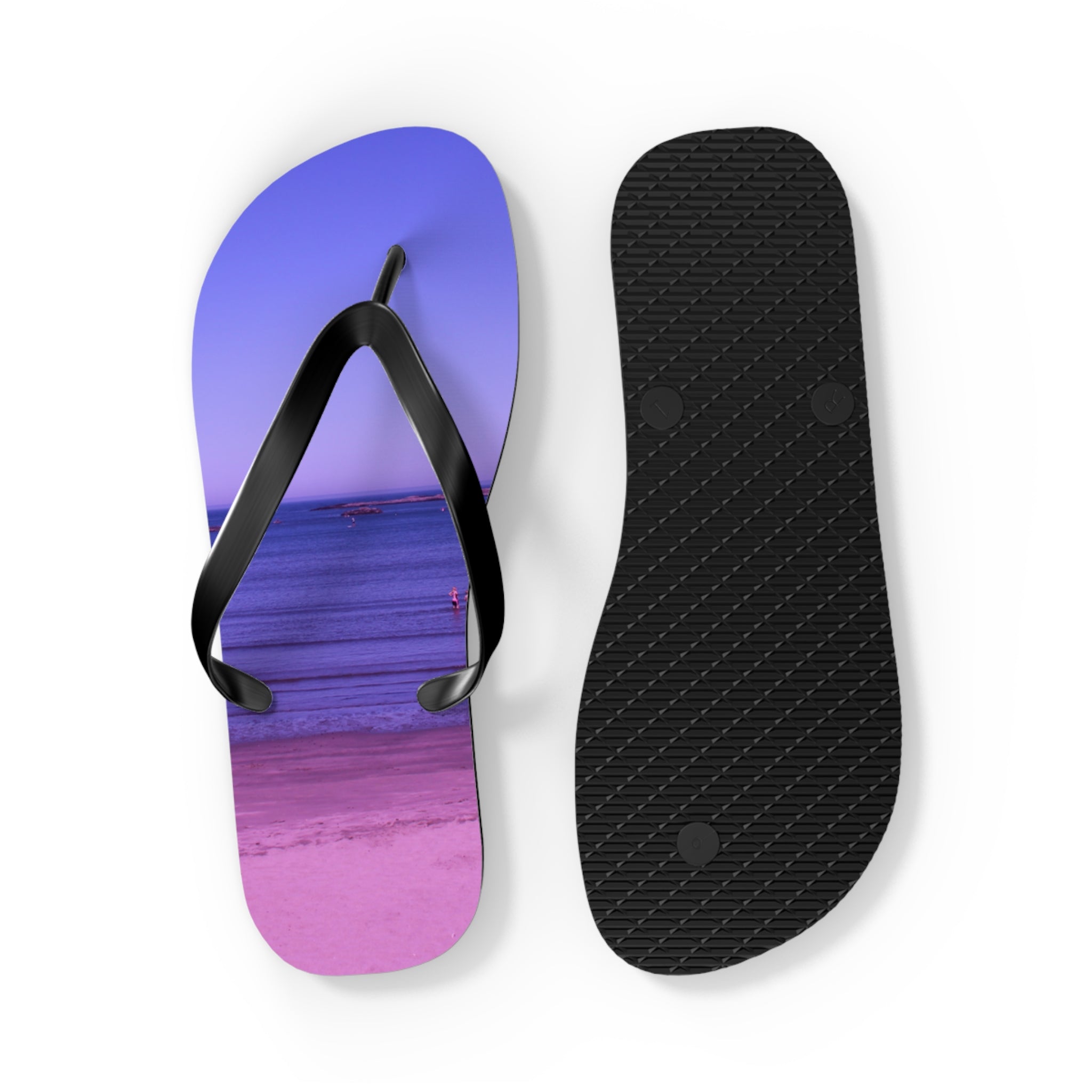Purple and pink gradient flip flop with a black strap on a white background.