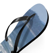Black flip-flop with a scenic mountain landscape print on the sole.